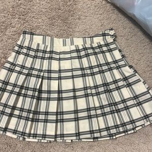 I am selling a black,white,and grey plaid skirt